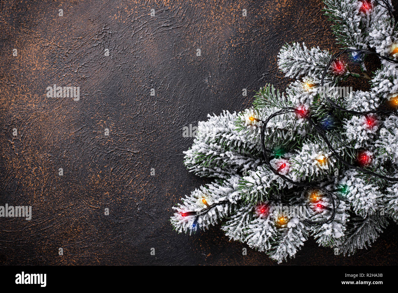 Christmas background with tree and garland lights Stock Photo Alamy
