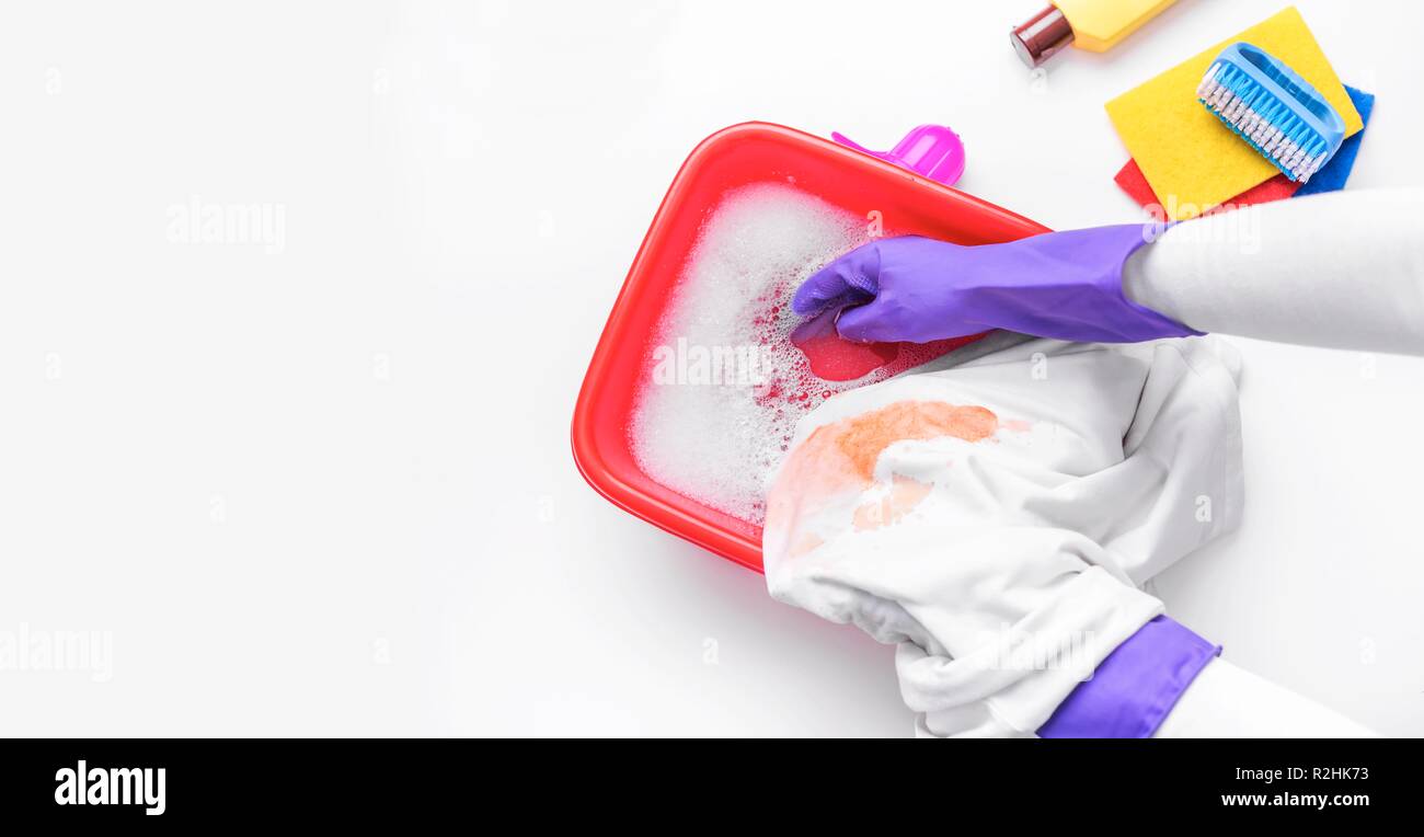 Women's hands wash stained clothes in a basin Stock Photo Alamy