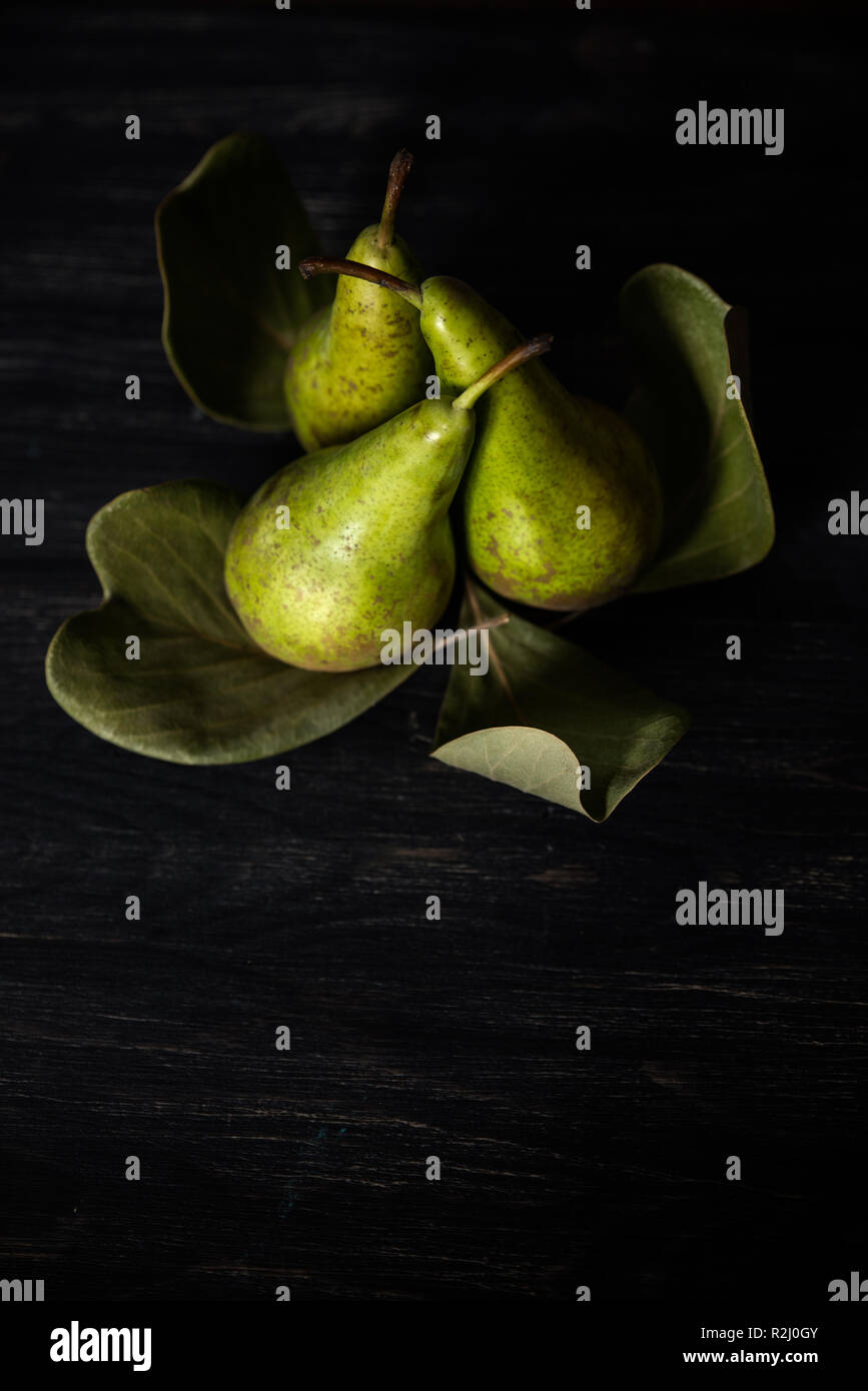 Pears arranged on leaves Stock Photo