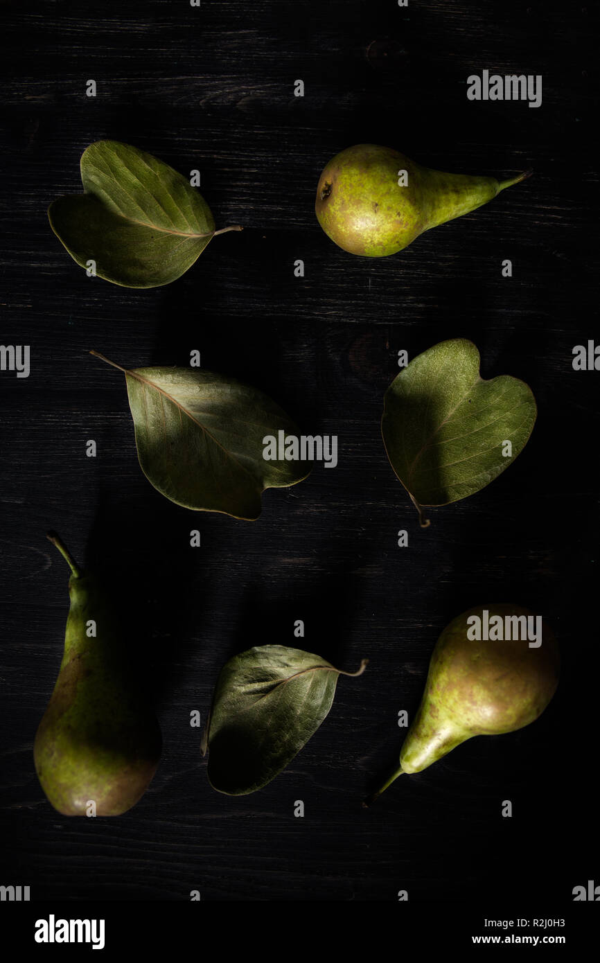 Pears arranged on leaves Stock Photo