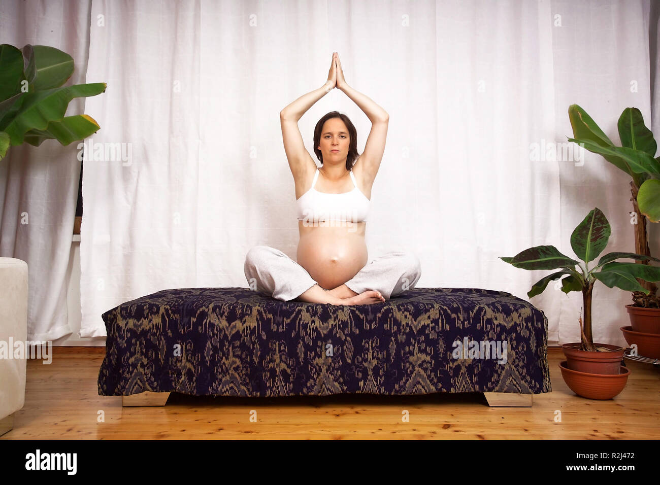 yoga on couch Stock Photo