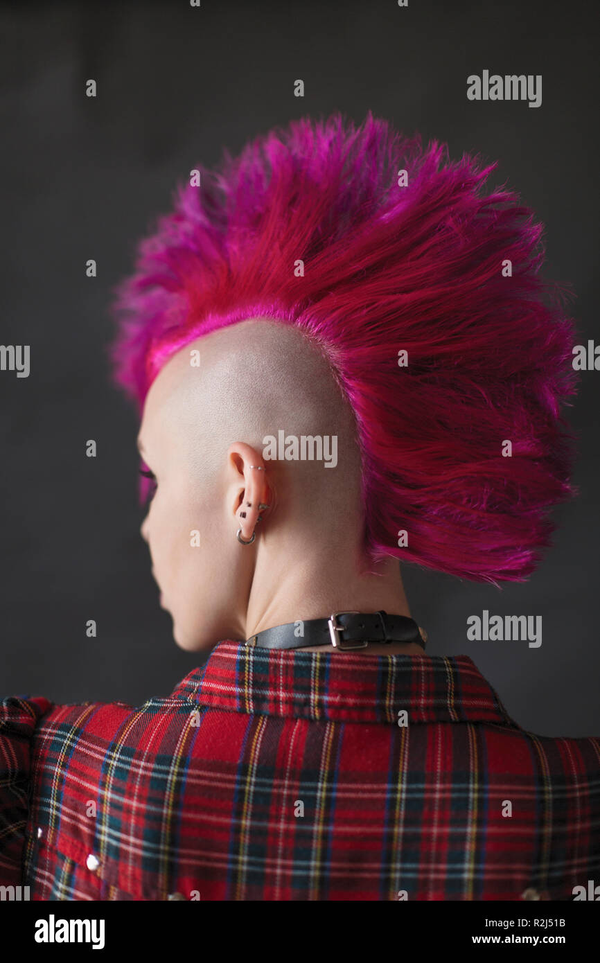 Cool young woman with pink mohawk Stock Photo
