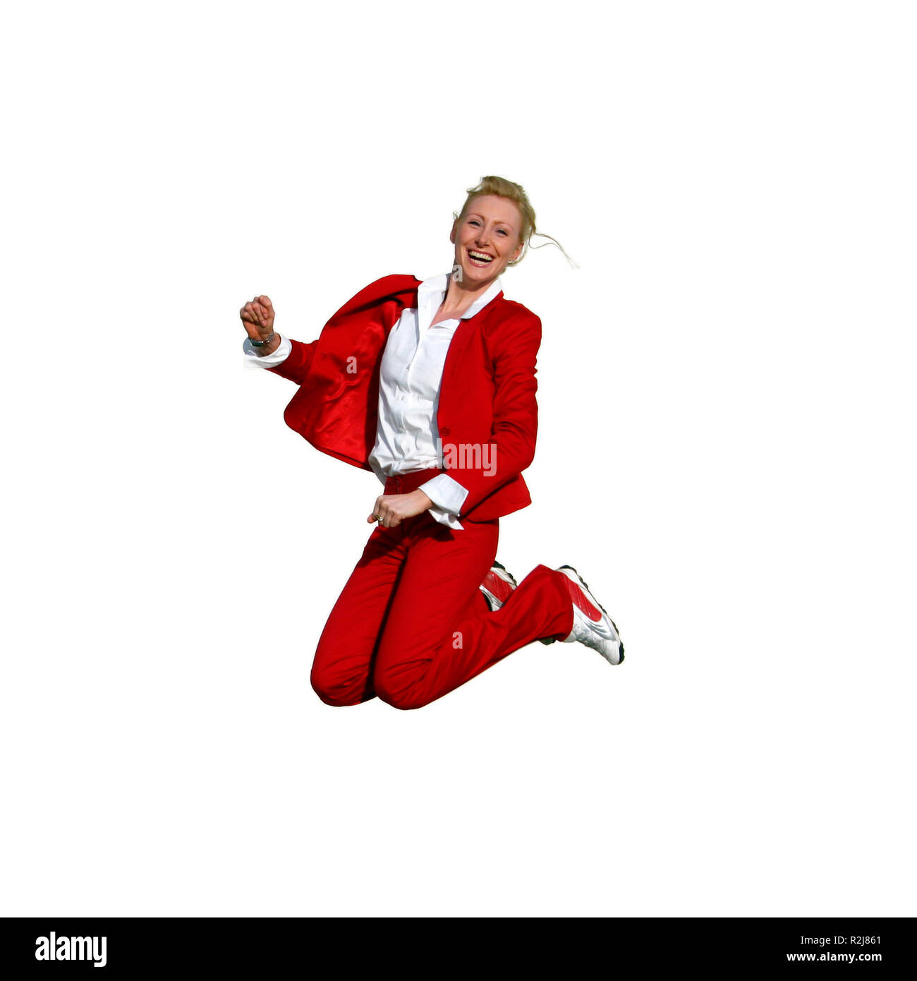blonde woman jumping Stock Photo