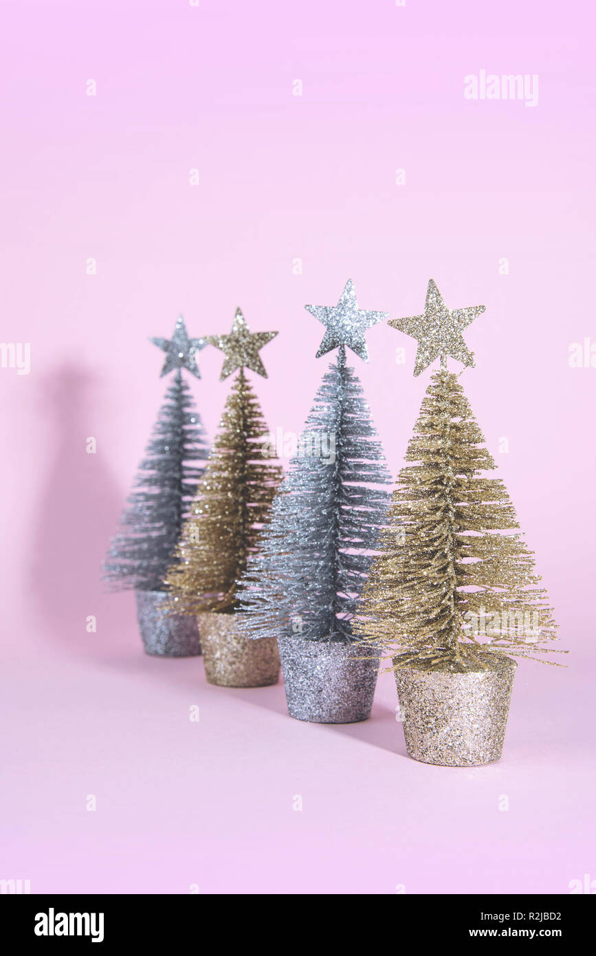Christmas tree over light blue background Stock Photo - Alamy