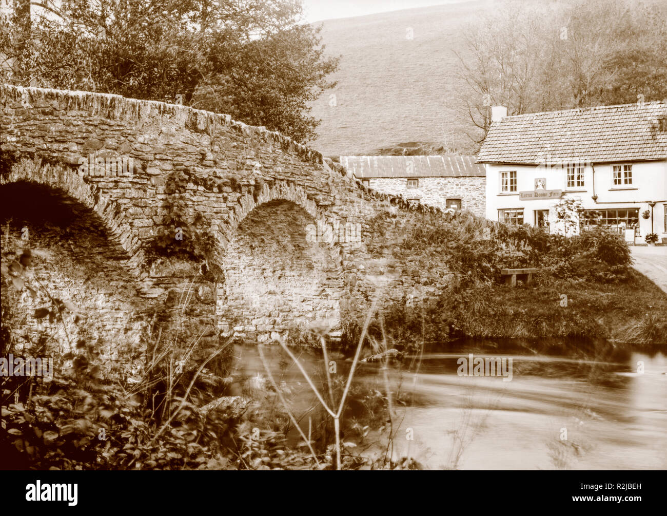 Sepia toned photograph taken on a paper negative in a 7 x 5 inch plate camera in October 2018 of  Lorna Doone Farm at Malmsmead, Devon, Exmoor UK. Stock Photo