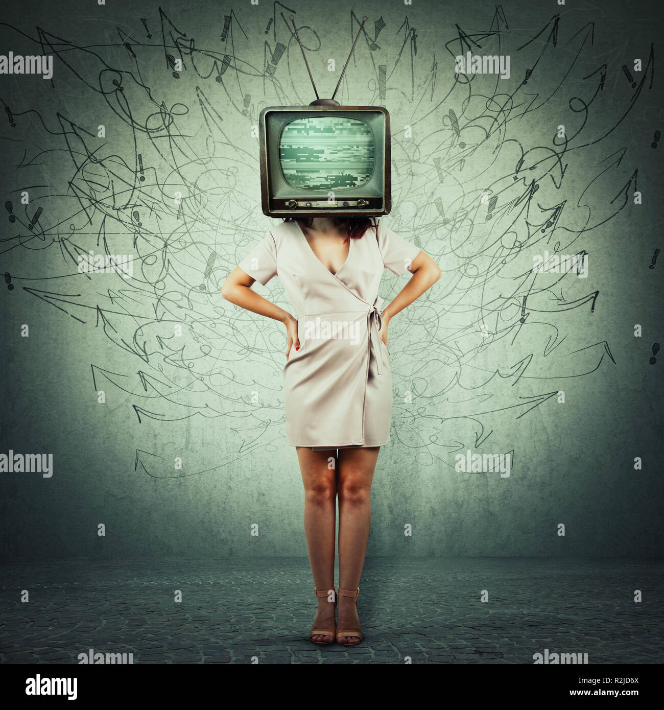 Full length portrait addicted young woman hands on hips and old tv instead of head. Television manipulation and brainwashing concept. Mass media propa Stock Photo