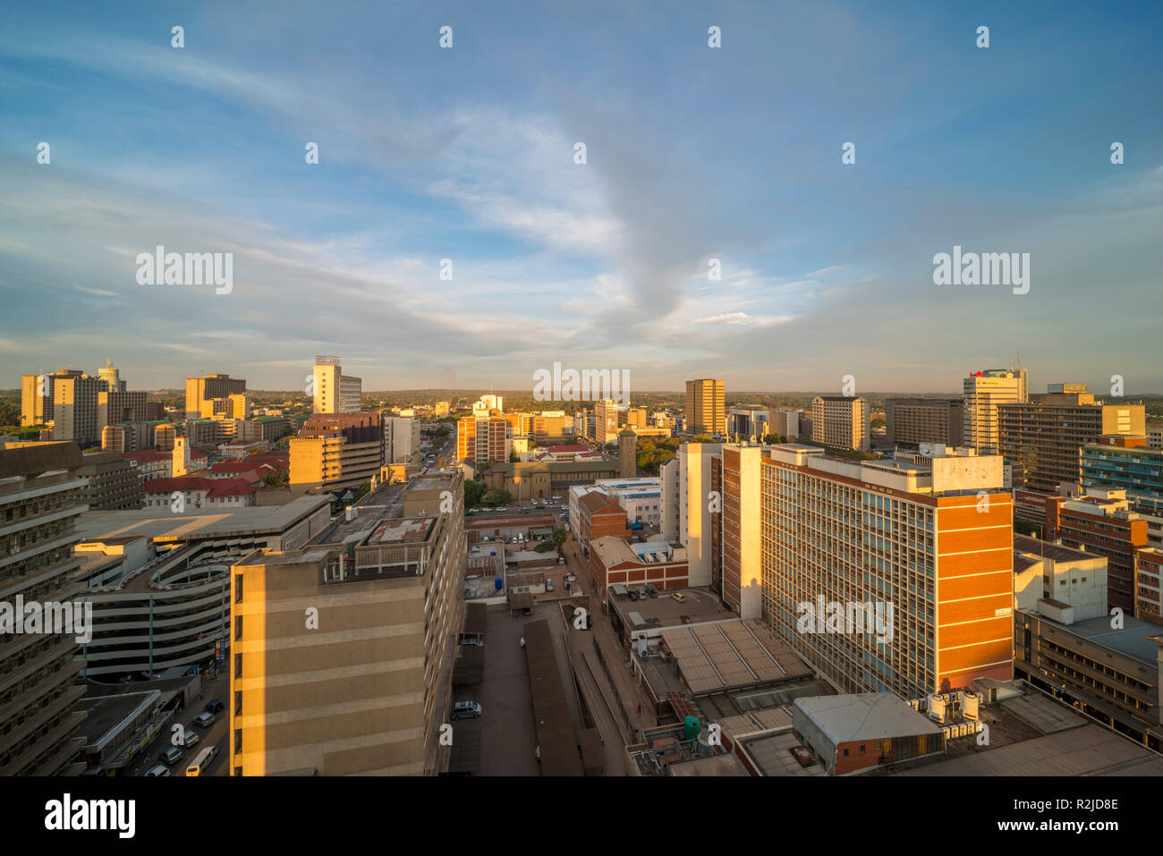 A sunset is seen over the Harare city skyline in Zimbabwe Stock Photo