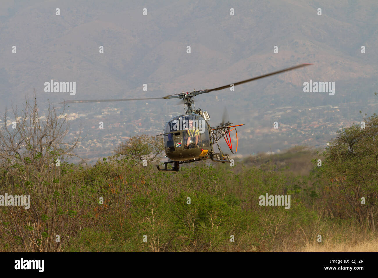 French Alouette helicopter landing at a bush destination in South