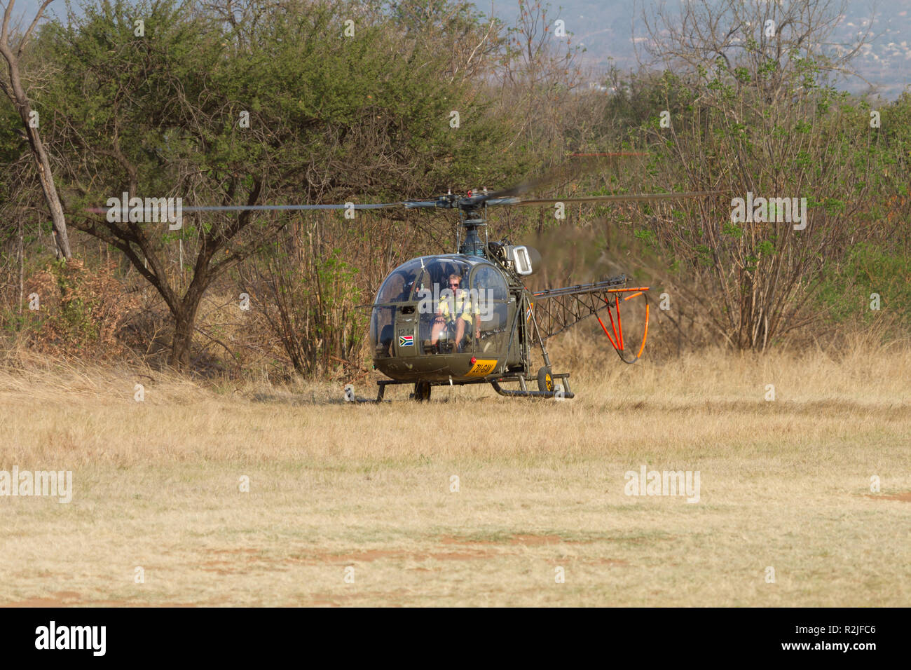 French Alouette helicopter landing at a bush destination in South