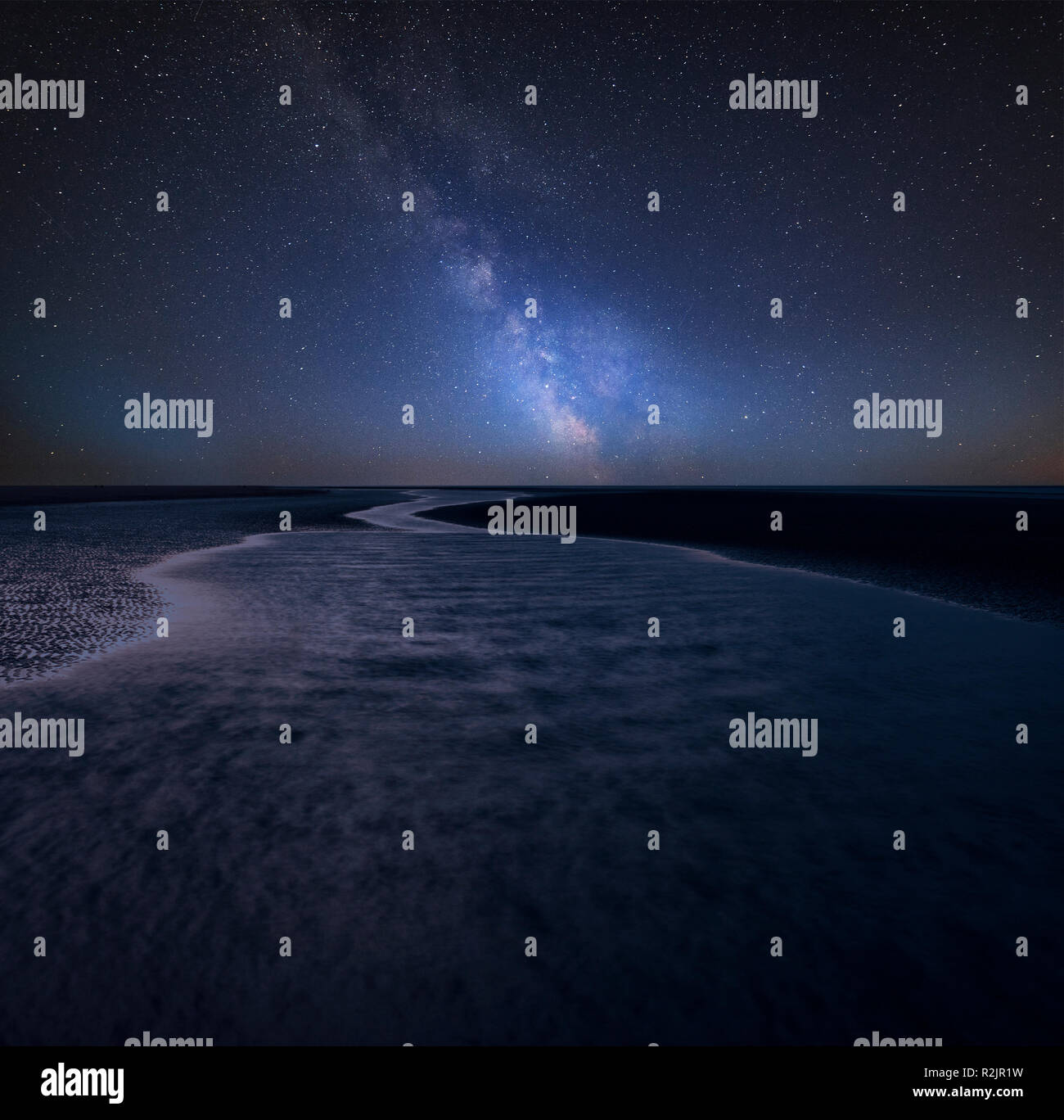 Stunning vibrant Milky Way composite image over landscape of beautiful ...