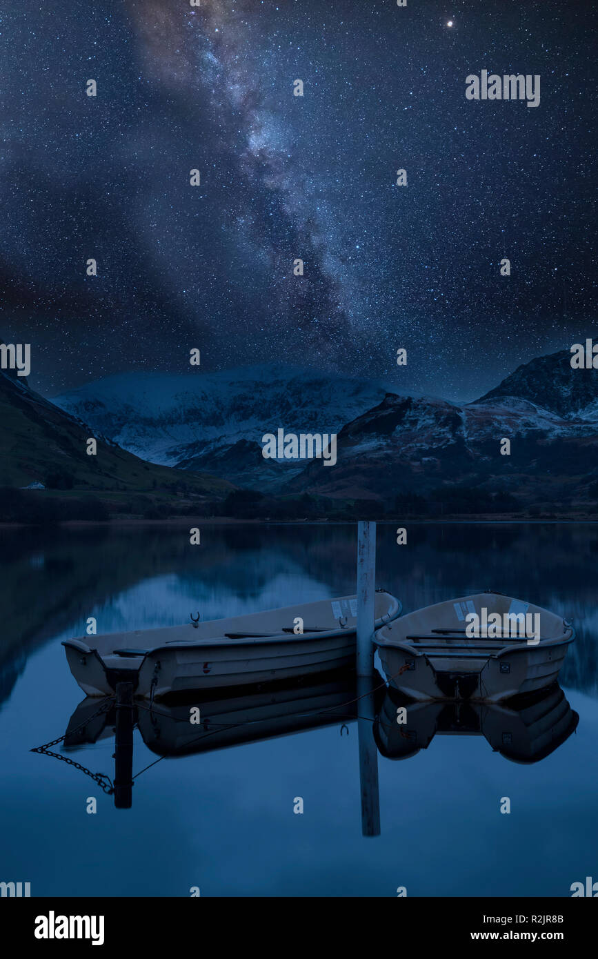 Stunning vibrant Milky Way composite image over landscape of Llyn ...