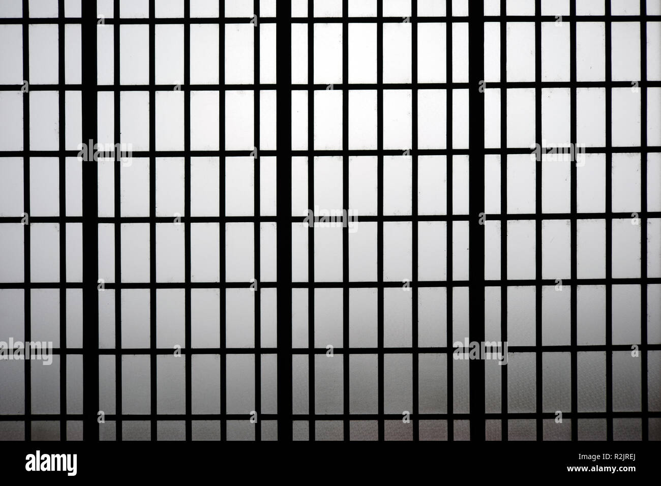 Close-up of a steel frame or steel grid with small windows, Stock Photo