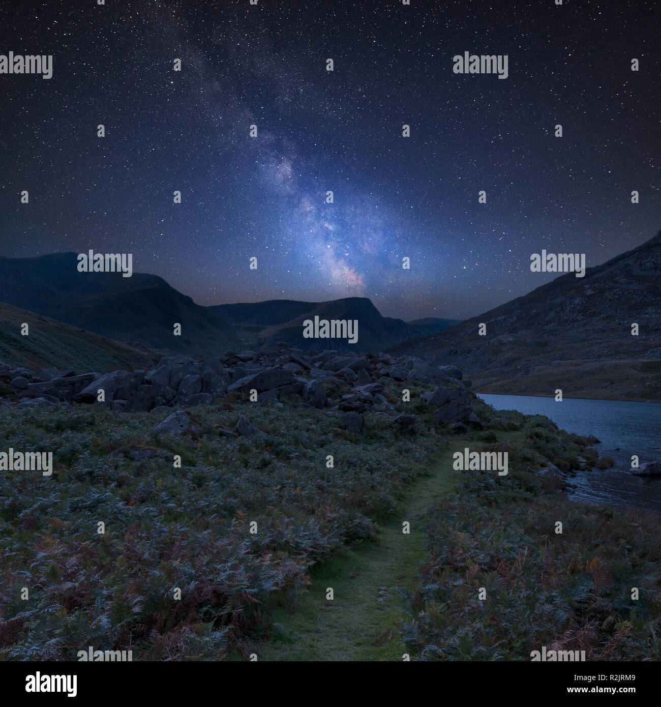 Stunning vibrant Milky Way composite image over Beautiful landscape ...
