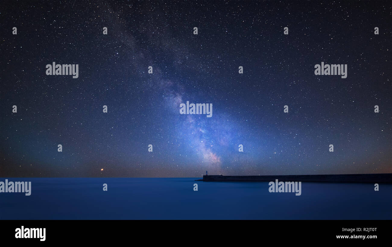 Stunning vibrant Milky Way composite image over landscape of Stunning ...