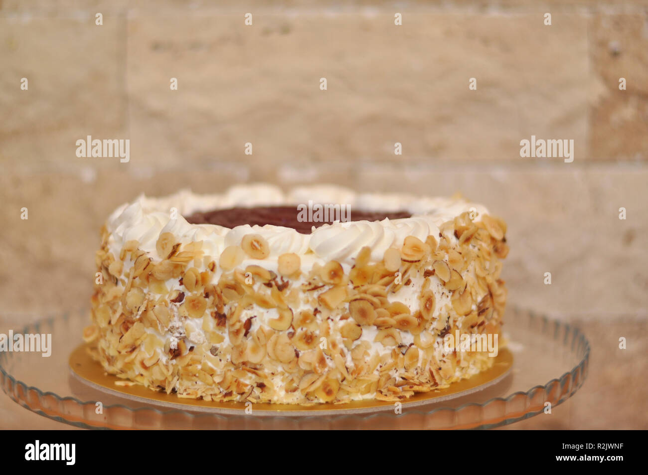 Delicious raspberry hazelnut cake with raspberry dressing on top and ...