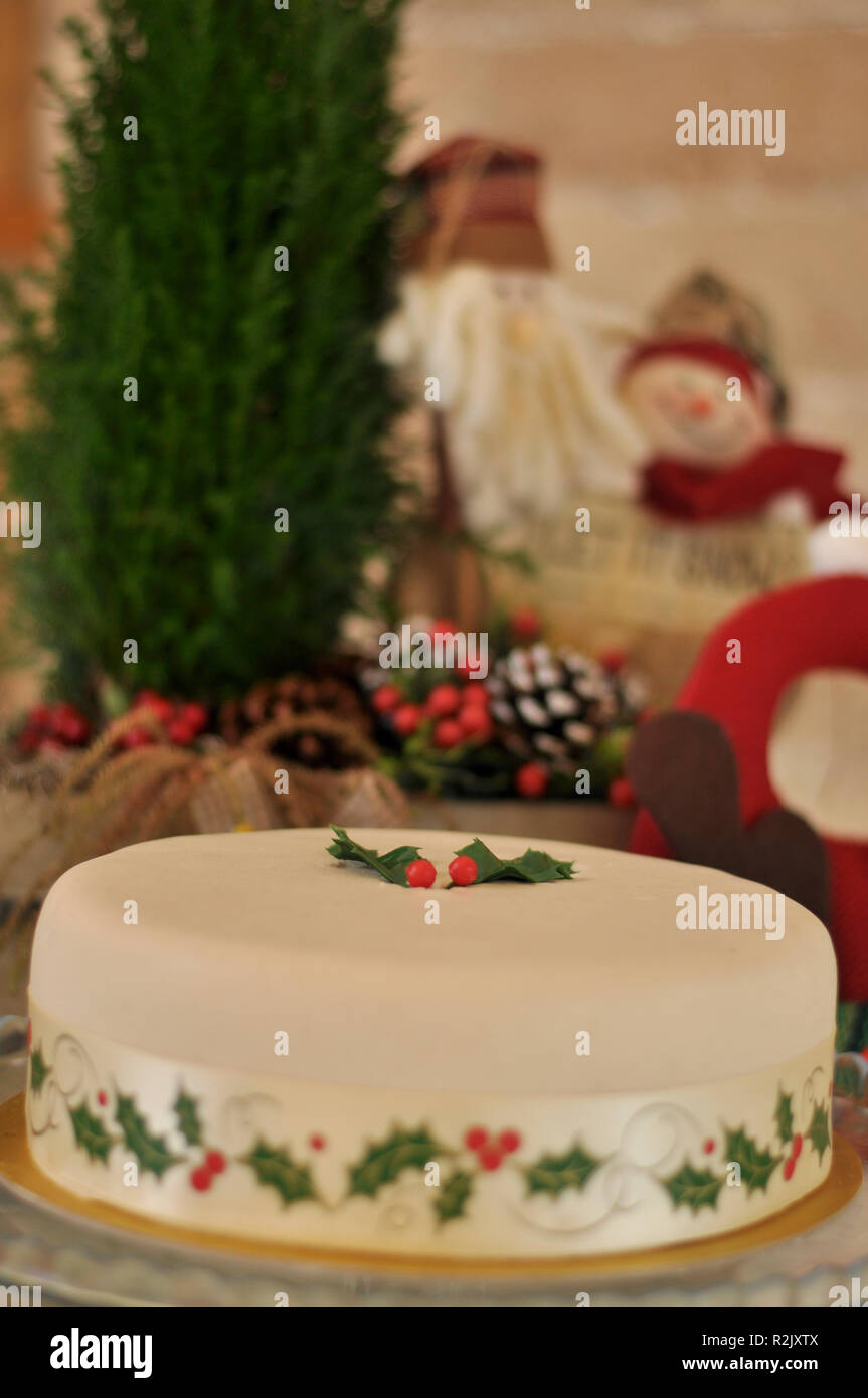 Delicious Marzipan Christmas Cake with christmas decorations Stock