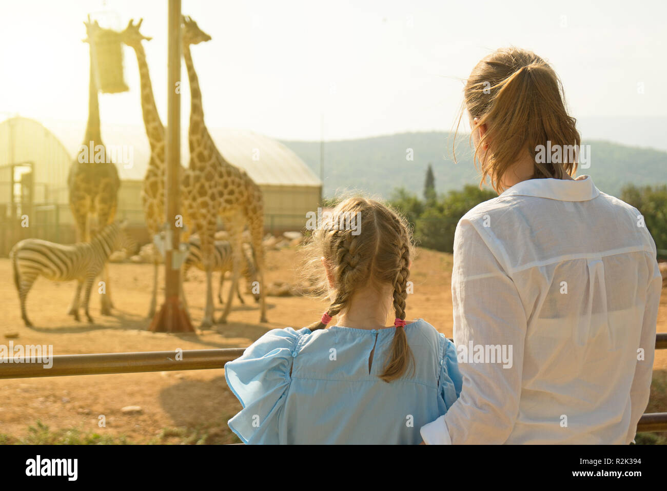 Woman And Her Daughter Visiting Zoo Stock Photo - Alamy