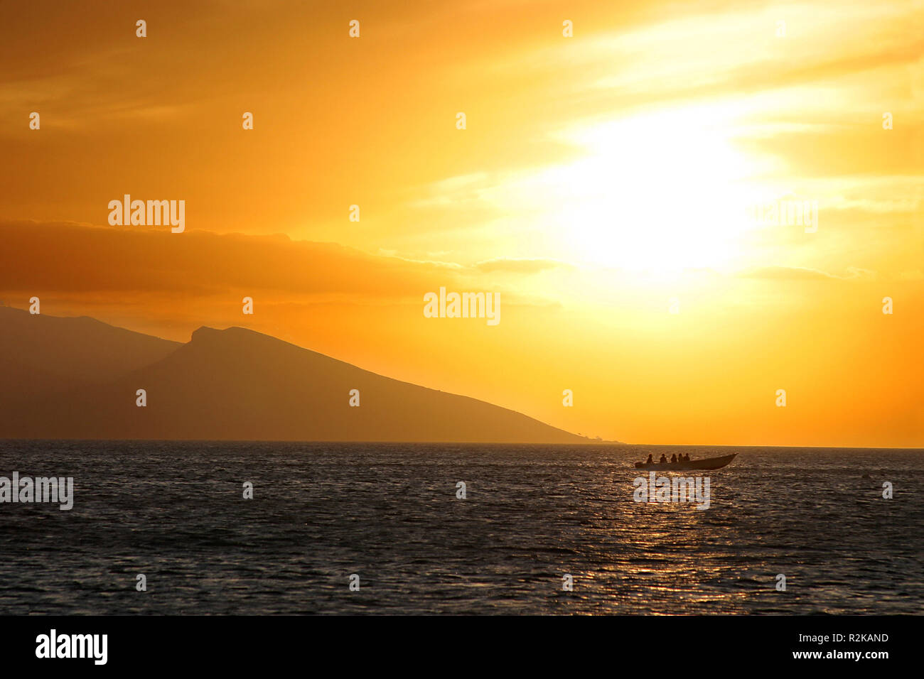 boat in the sea before sunset Stock Photo - Alamy