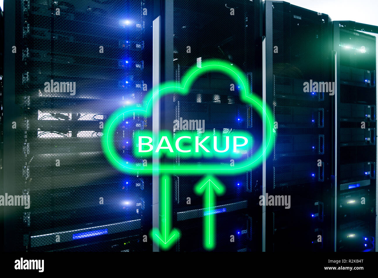 Backup button on modern server room background. Data loss prevention ...