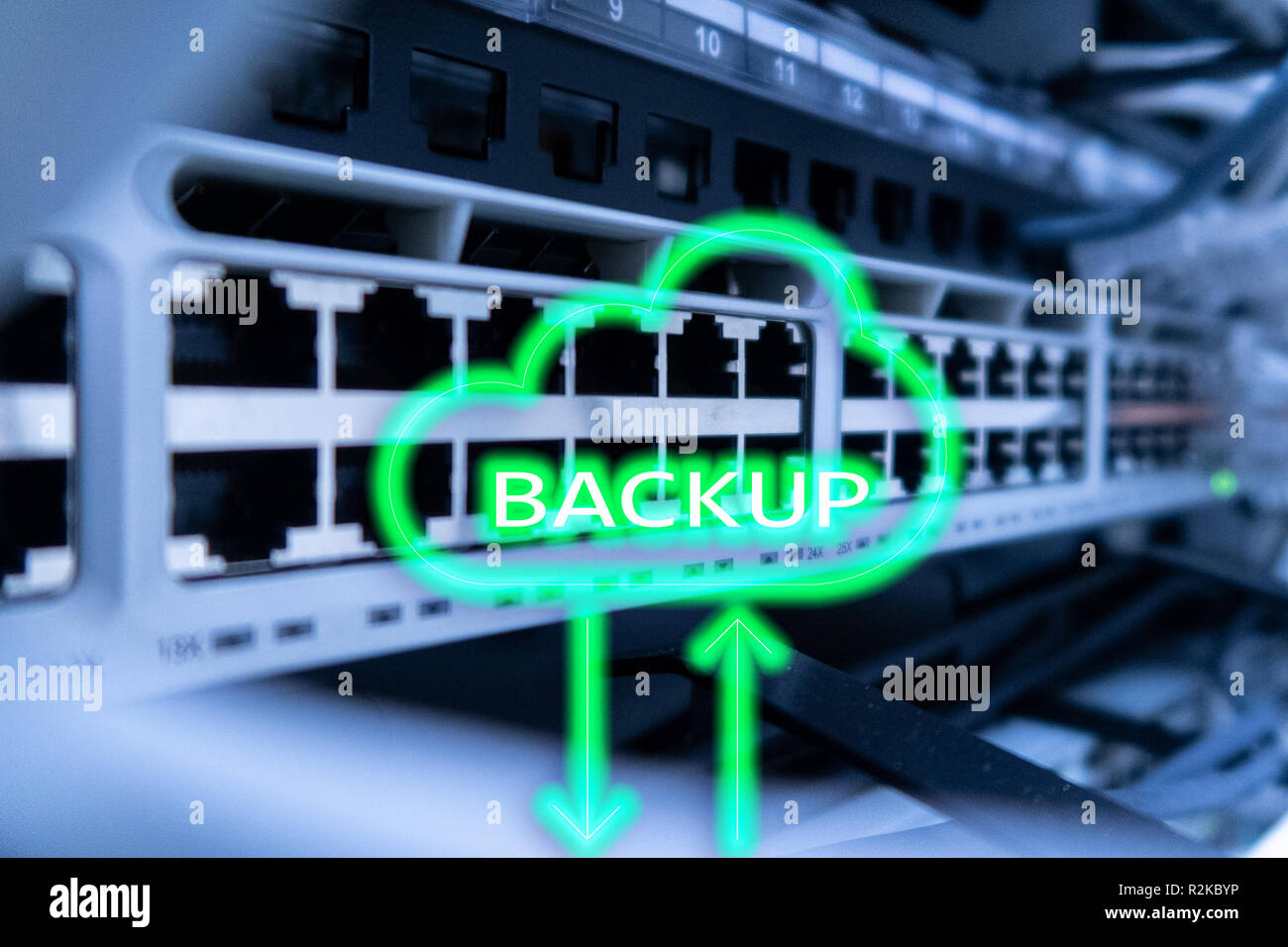 Backup button on modern server room background. Data loss prevention ...
