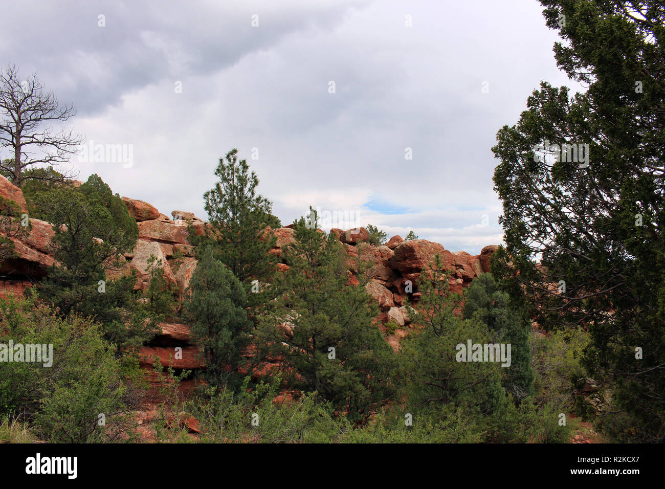 A mountainside of red rock boulders on the Siamese Twins Trail at the ...