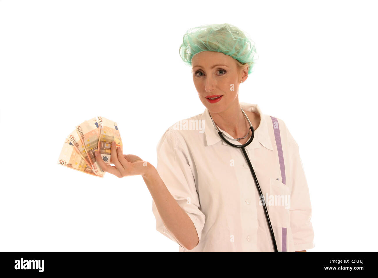 nurse holding money in hand Stock Photo