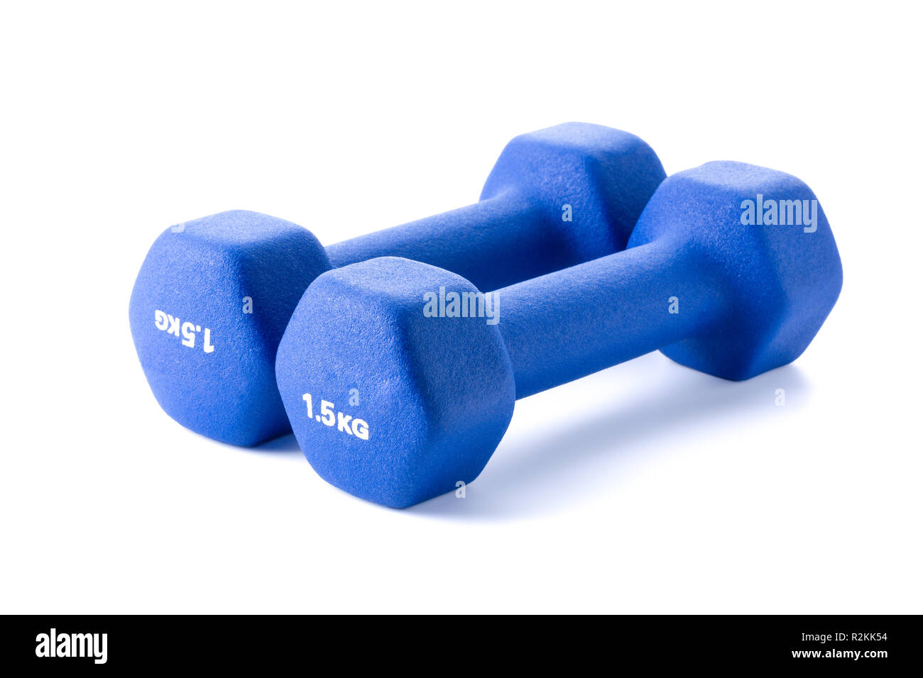 Two small blue dumbbells isolated on white background, Stock Photo