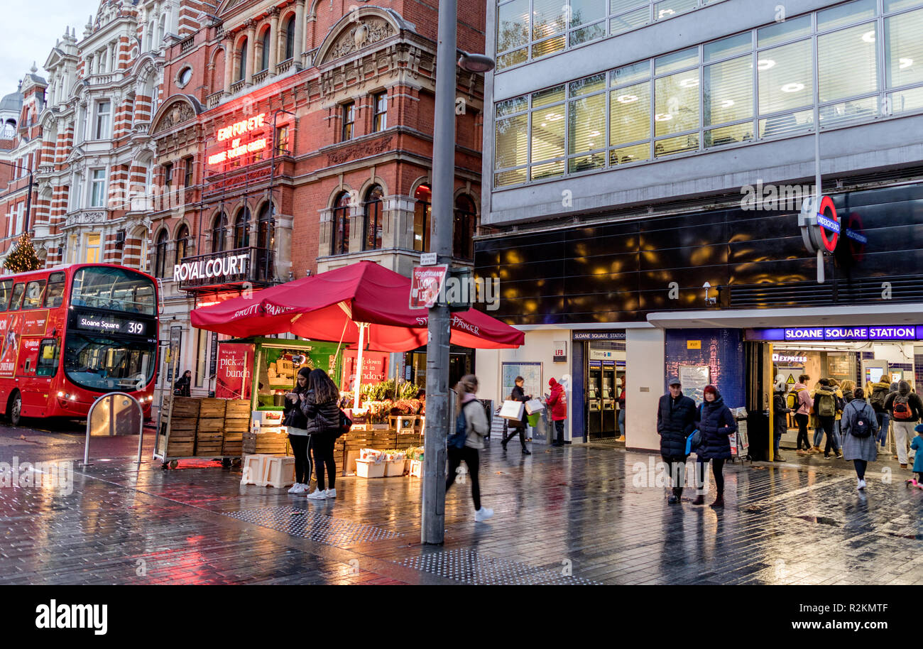 People outside Sloane Square Tube Station Chelsea London UK Stock Photo