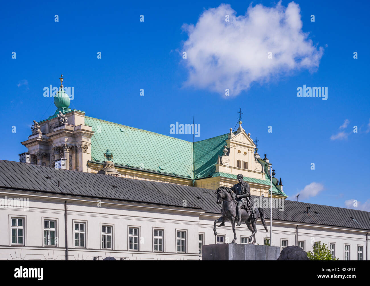 monument to Prince Jozef Pontiatowsk in the courtyard of the Presidential Palace in Warsaw, in the background the 17th century Carmelite Church, Warsa Stock Photo