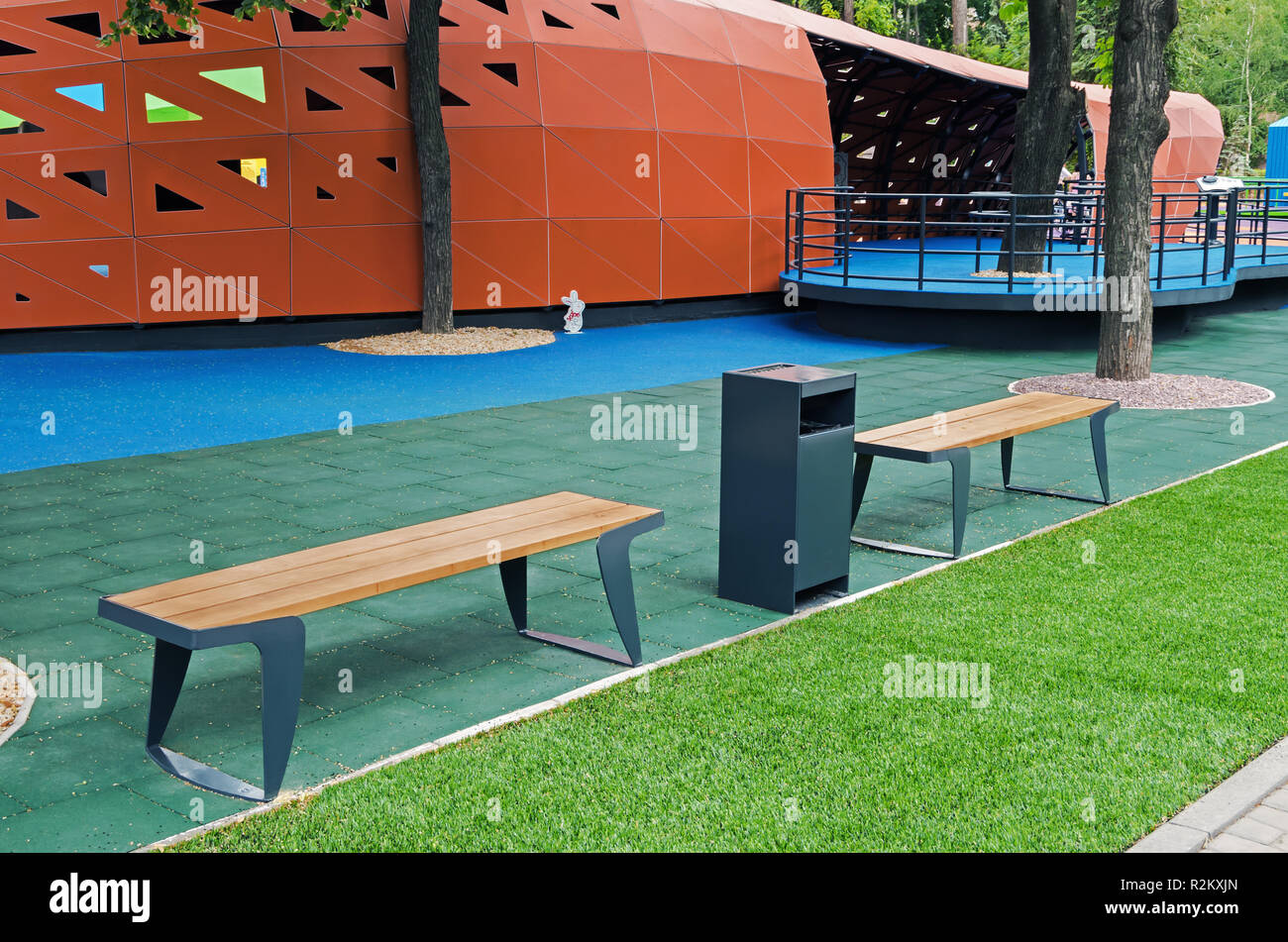 Wooden Benches For Rest In A Childrens Inclusive Gaming Park Stock