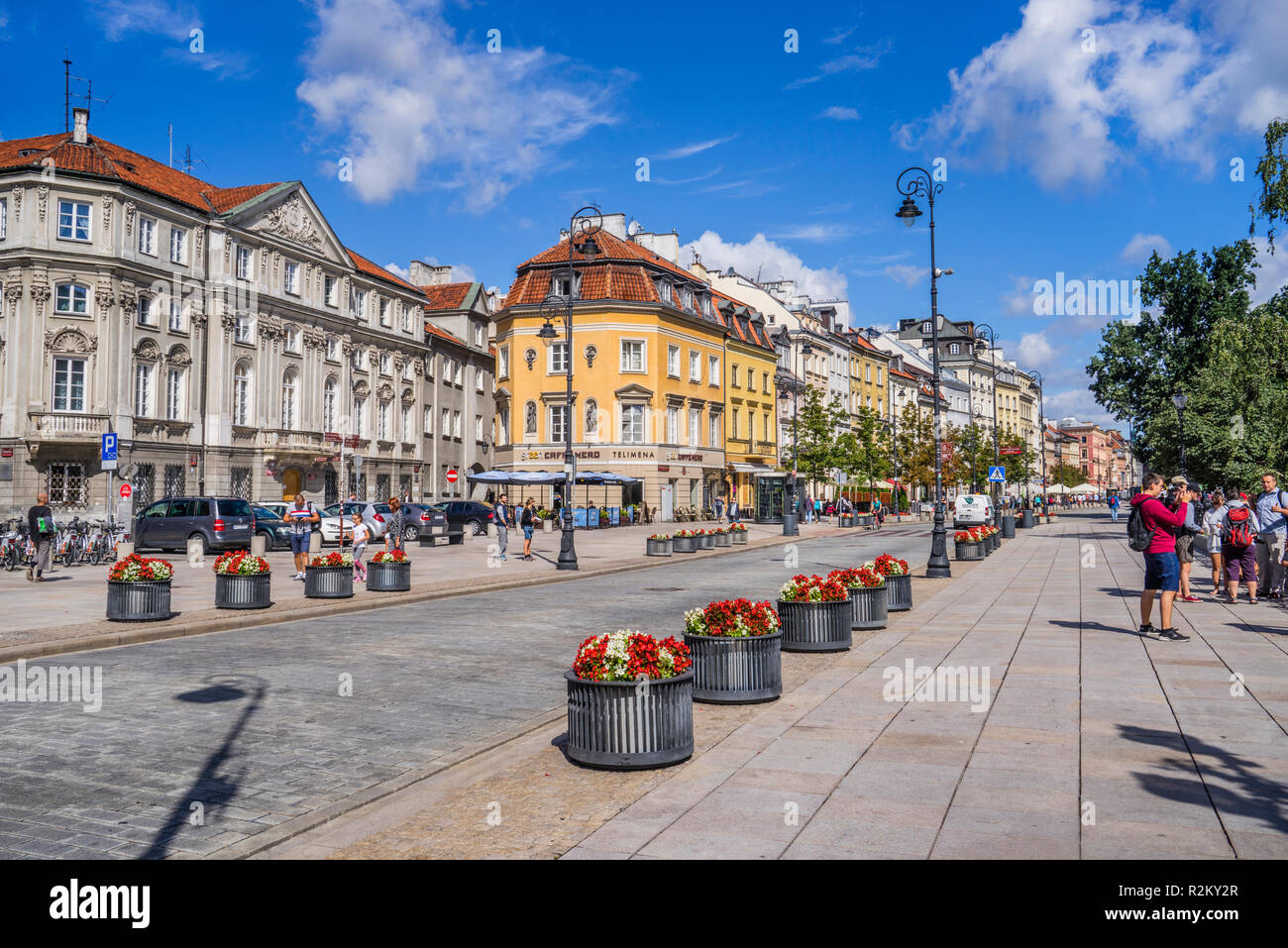 view of Krakowskie Przedmiescie, one of the best known and most prestigiuos streets of Poland's capital, Warsaw, Poland Stock Photo
