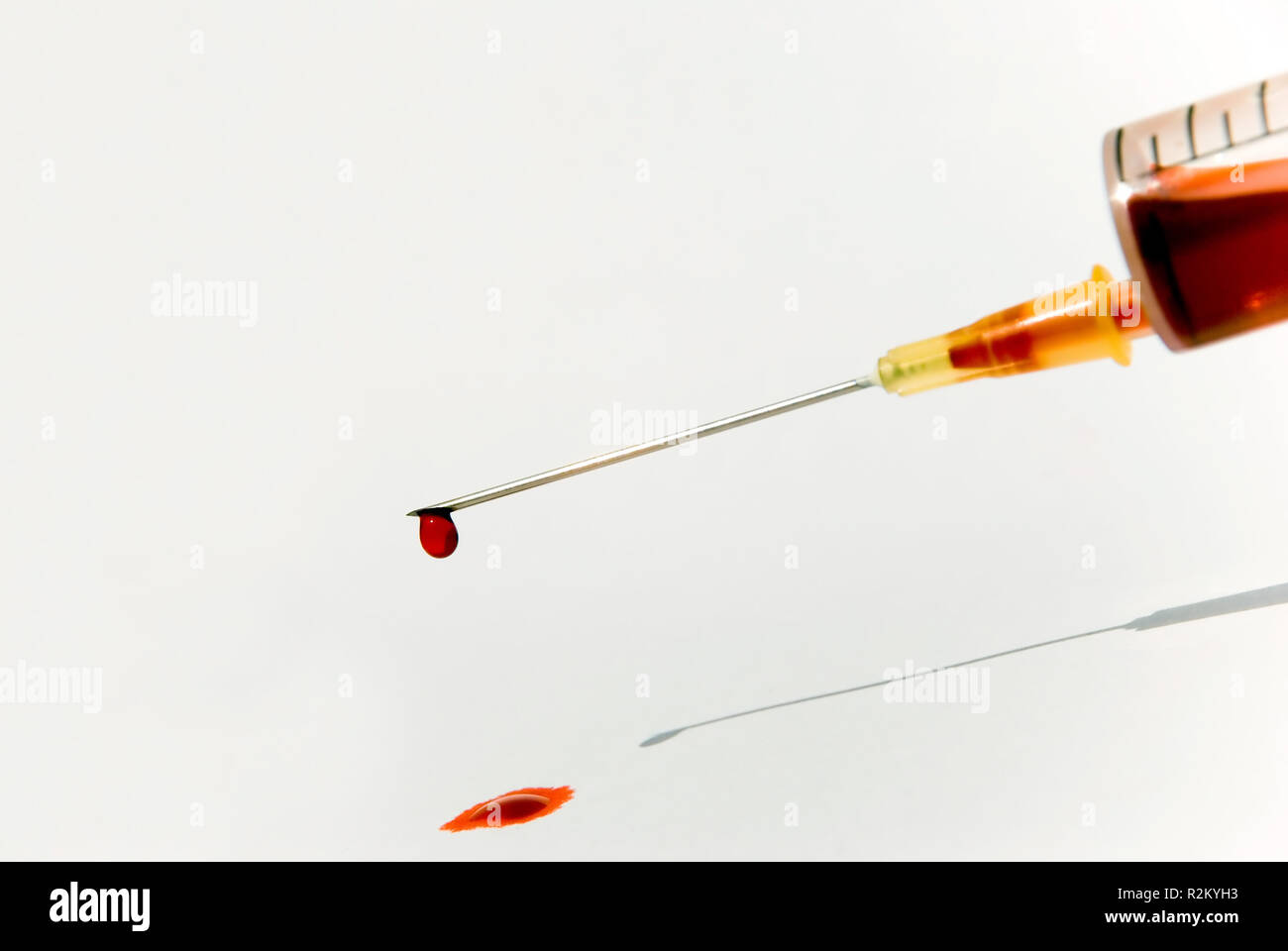 syringe with blood 2 Stock Photo
