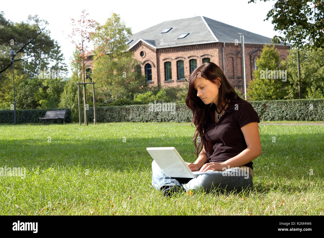 young woman with laptop Stock Photo