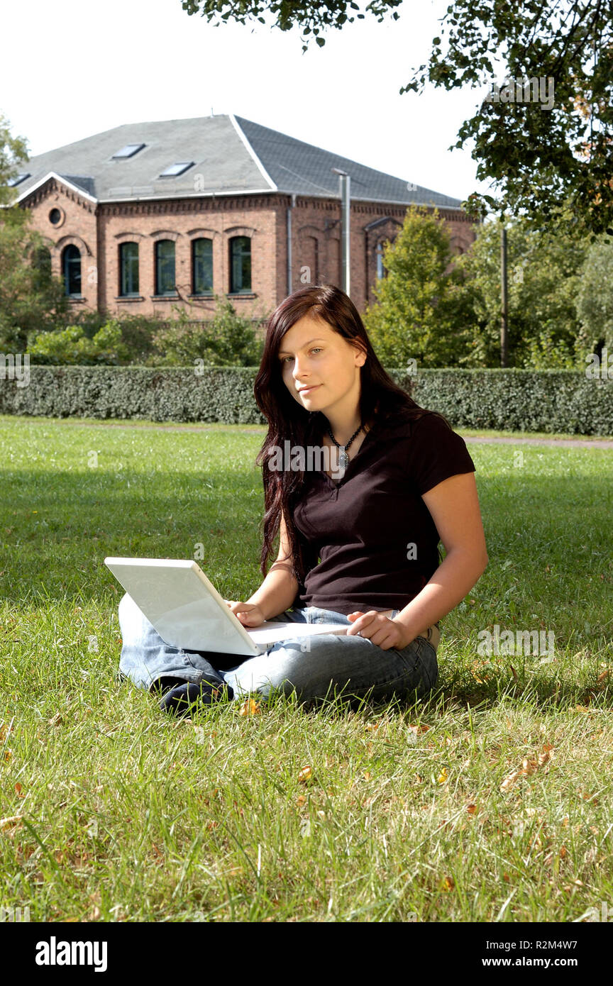 young woman with laptop Stock Photo