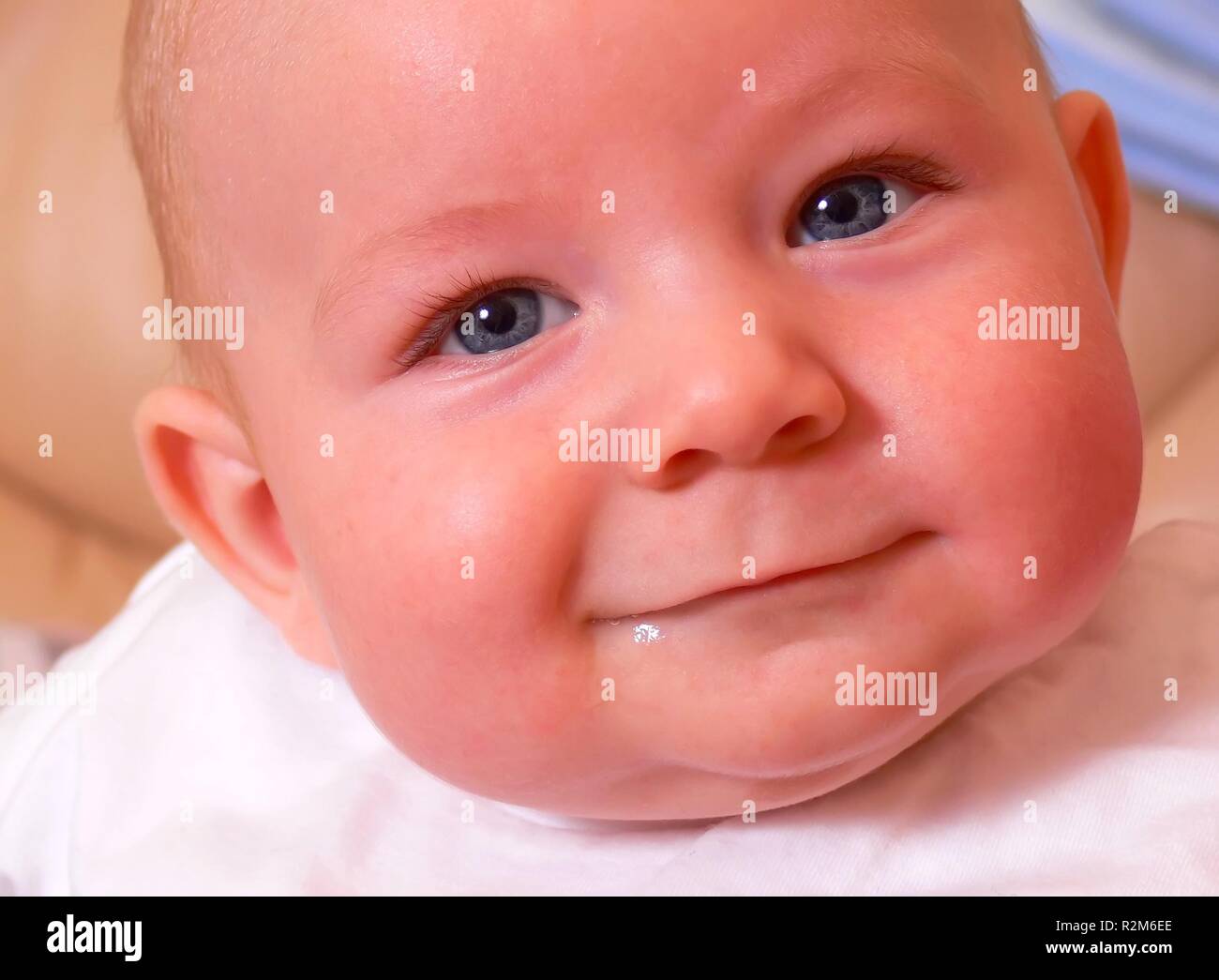 the baby smile joyful eyes Stock Photo