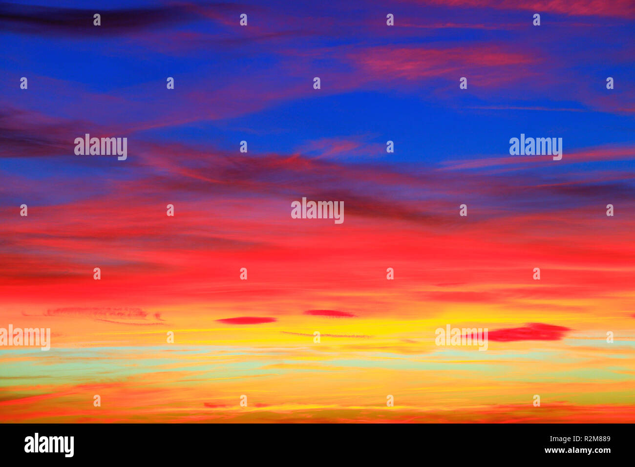 Red, orange, pink, yellow, blue sky, after sunset, multi colour, colours, skies, setting of the sun, evening, after sunset, Stock Photo