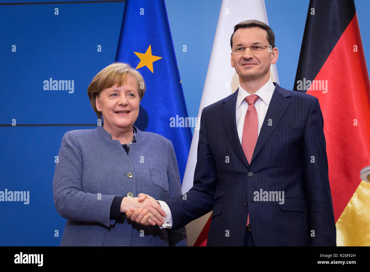 Polish Prime Minister Mateusz Morawiecki (R) and German Chancellor Angela Merkel (L) attend a press conference after their meeting at the Chancellery of the Prime Minister in Warsaw, Poland on 19 March 2018 Stock Photo