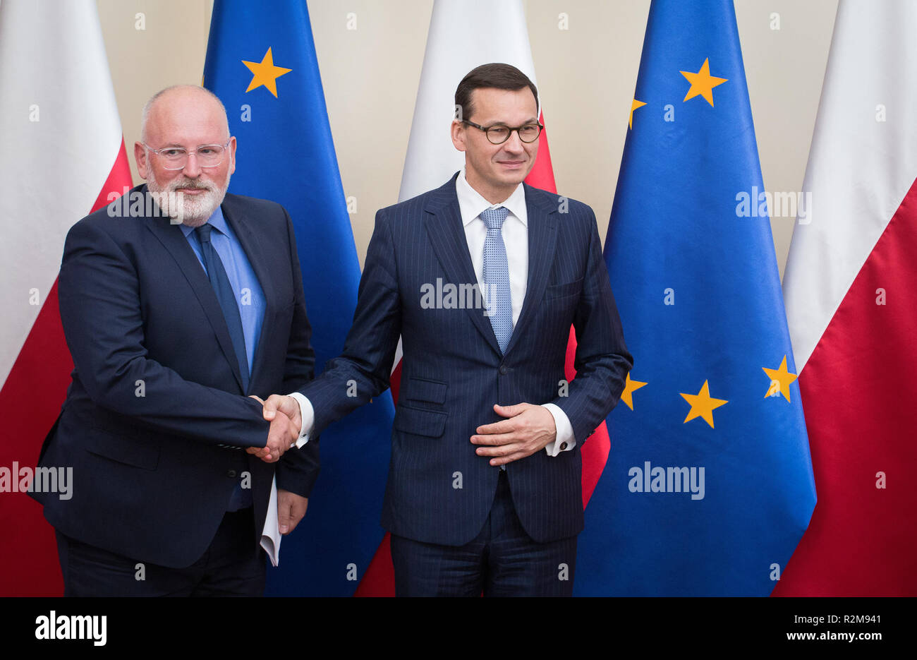 First Vice-President of European Commission Frans Timmermans (L) and Polish Prime Minister Mateusz Morawiecki (R) during a meeting at Chancellery of the Prime Minister in Warsaw, Poland on 18 June 2018. Stock Photo