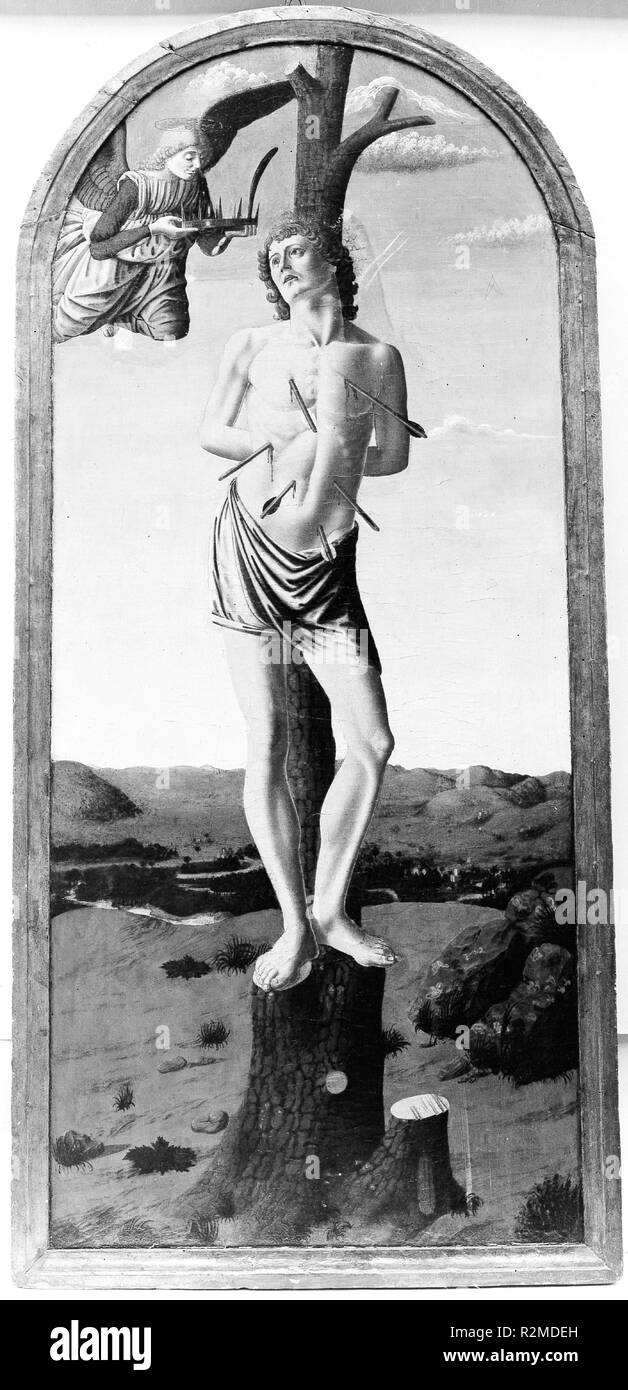Saint Sebastian. Artist: Francesco Botticini (Francesco di Giovanni) (Italian, Florentine, ca. 1446-1497). Dimensions: Overall, with arched top and engaged frame, 56 3/4 x 26 1/4 in. (144.1 x 66.7 cm); painted surface 53 3/4 x 23 in. (136.5 x 58.4 cm).  The picture was purchased as a work of Andrea del Castagno. The treatment of the landscape, however, is uncharacteristic of Castagno's work, as is the feebly constructed figure. The closest affinities of style are with works by Francesco Botticini (about 1446-97), who seems to have been active in the workshop of Verrocchio in the late 1460s. Al Stock Photo