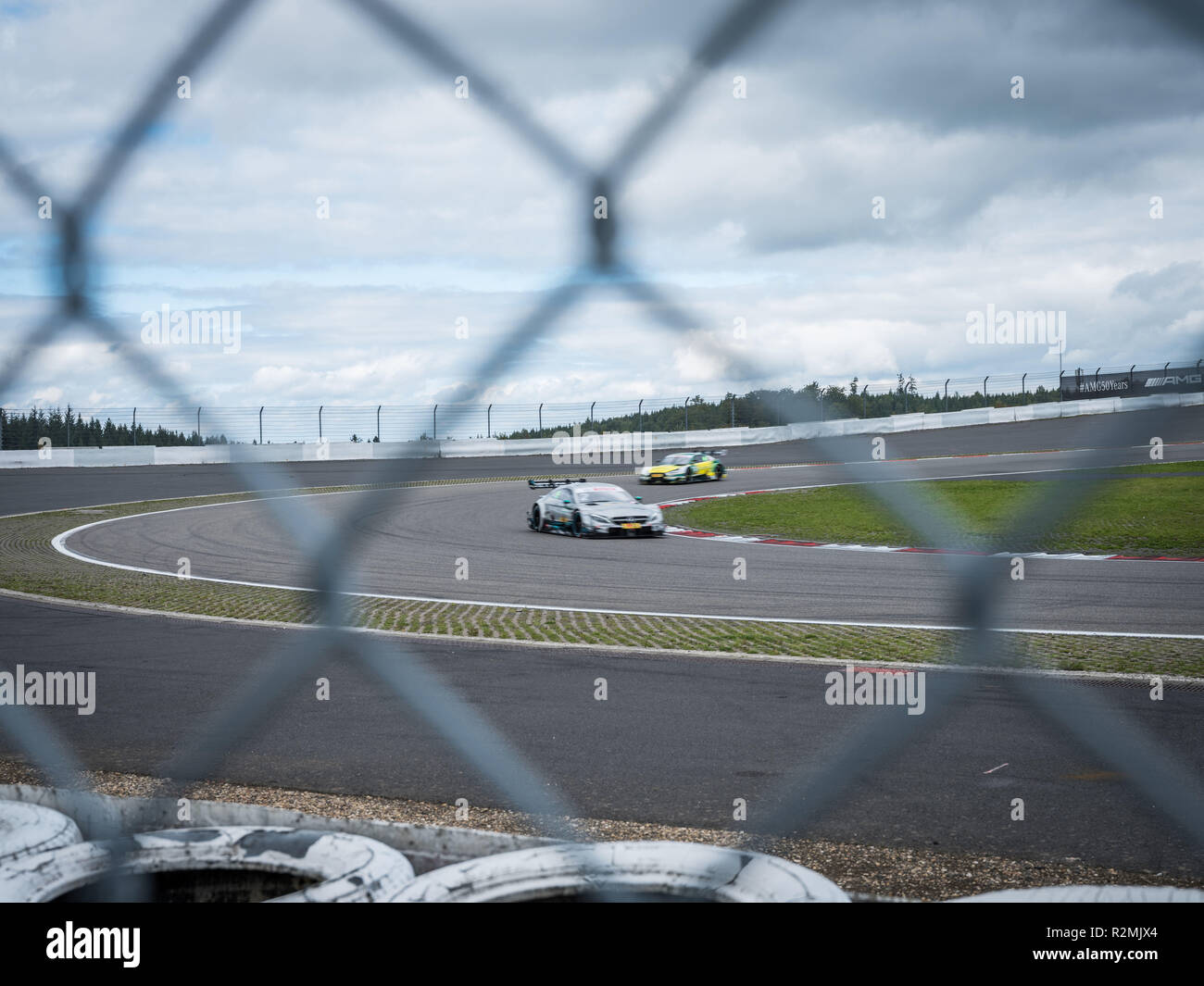 two DTM racing cars in a curve Stock Photo