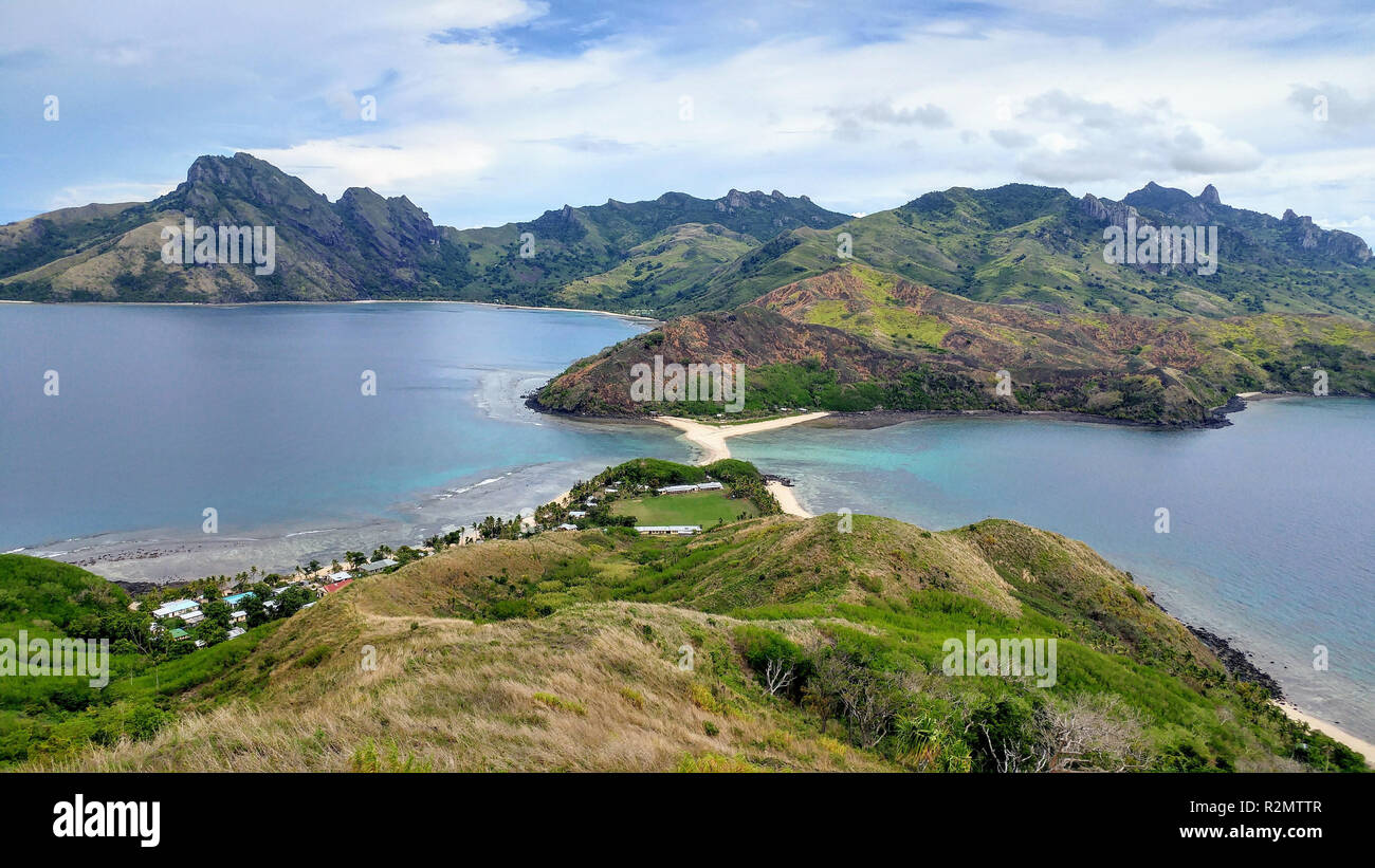 Two islands connected by strips of sand hires stock photography and