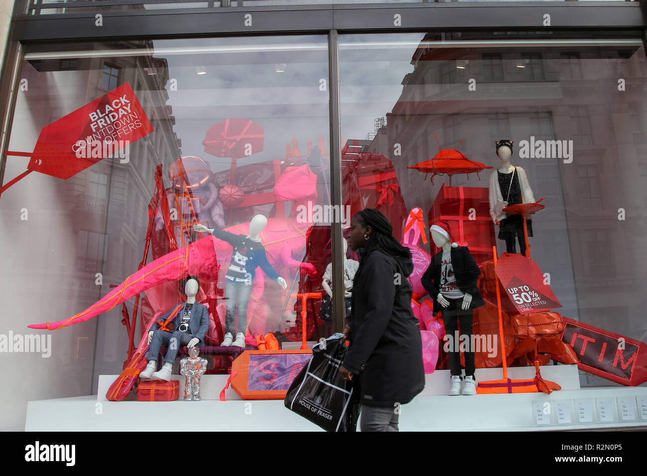 A woman seen at the London's Regents Street as the H&M store prepares for  the Black Friday Event with huge savings. Black Friday is a shopping event  that originated from the US