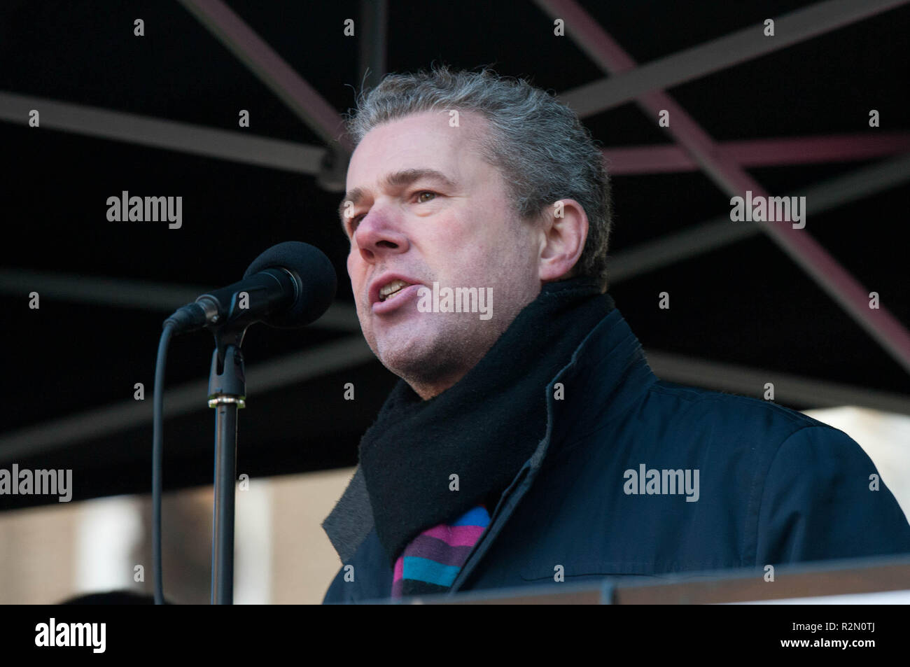 General Secretary of the Public and Commercial Services Union Mark Serwotka seen speaking during the protest. Huge crowds marched from the BBC in Portland Place to Whitehall with flags and placards during the National Unity Demonstration to oppose the rise of fascist and racist activity in Europe, The demonstration was called by Unite against Fascism, Love Music Hate Racism and Stand up to racism movements. The speeches in Whitehall were disrupted by the presence of a small number of far right activists and Trump supporters. Stock Photo