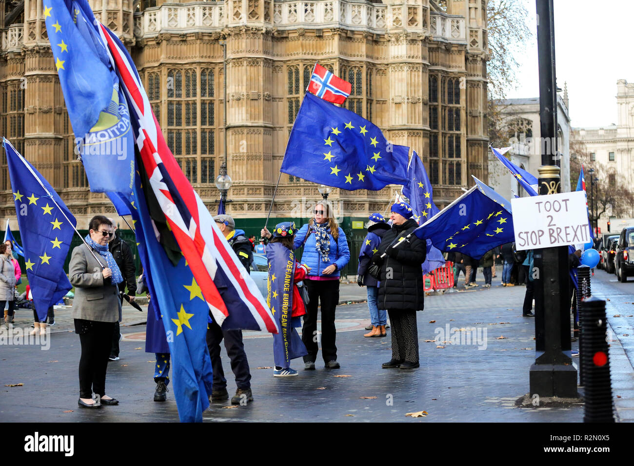 Pro-EU protesters from SODEM (Stand in Defiance European Movement)  demonstrate outside the Palace of Westminster in central London ahead of the crucial week of Brexit negotiations as Prime Minister Theresa May prepares to meet Chief negotiator Michel Barnier later this week to discuss the withdrawal deal. Stock Photo