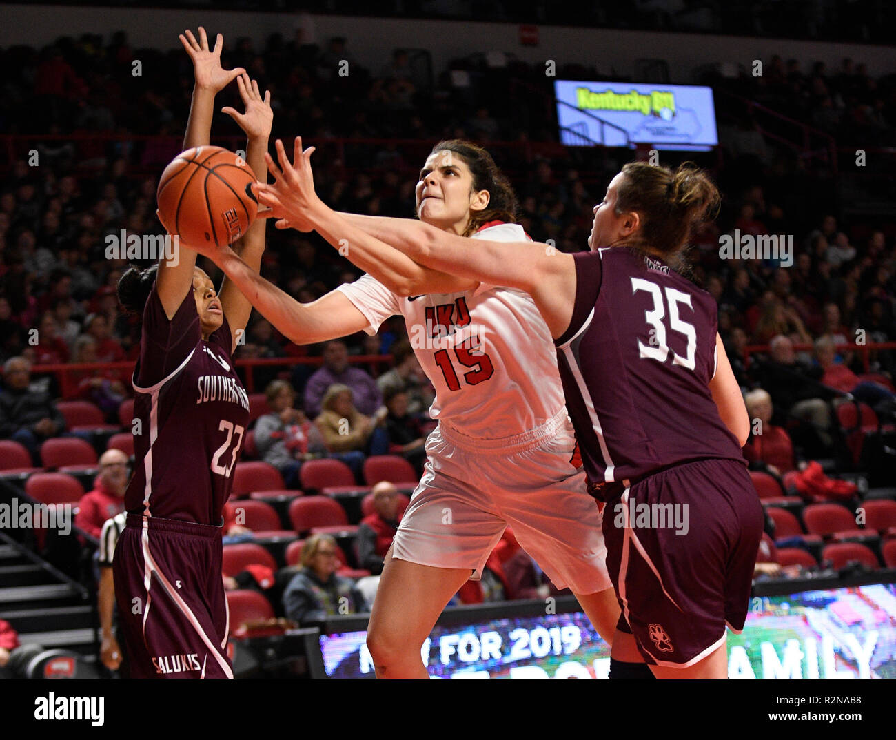 November 20, 2018; Western Kentucky Hilltoppers forward Raneem Elgedawy (15) gets fouled by Southern Illinois Salukis forward/center Celina VanHyfte (35) during a NCAA basketball game between the Southern Illinois Salukis and the Western Kentucky Hilltoppers at E. A. Diddle Arena in Bowling Green, KY. (Mandatory Photo Credit: Steve Roberts/Cal Sport Media) Stock Photo
