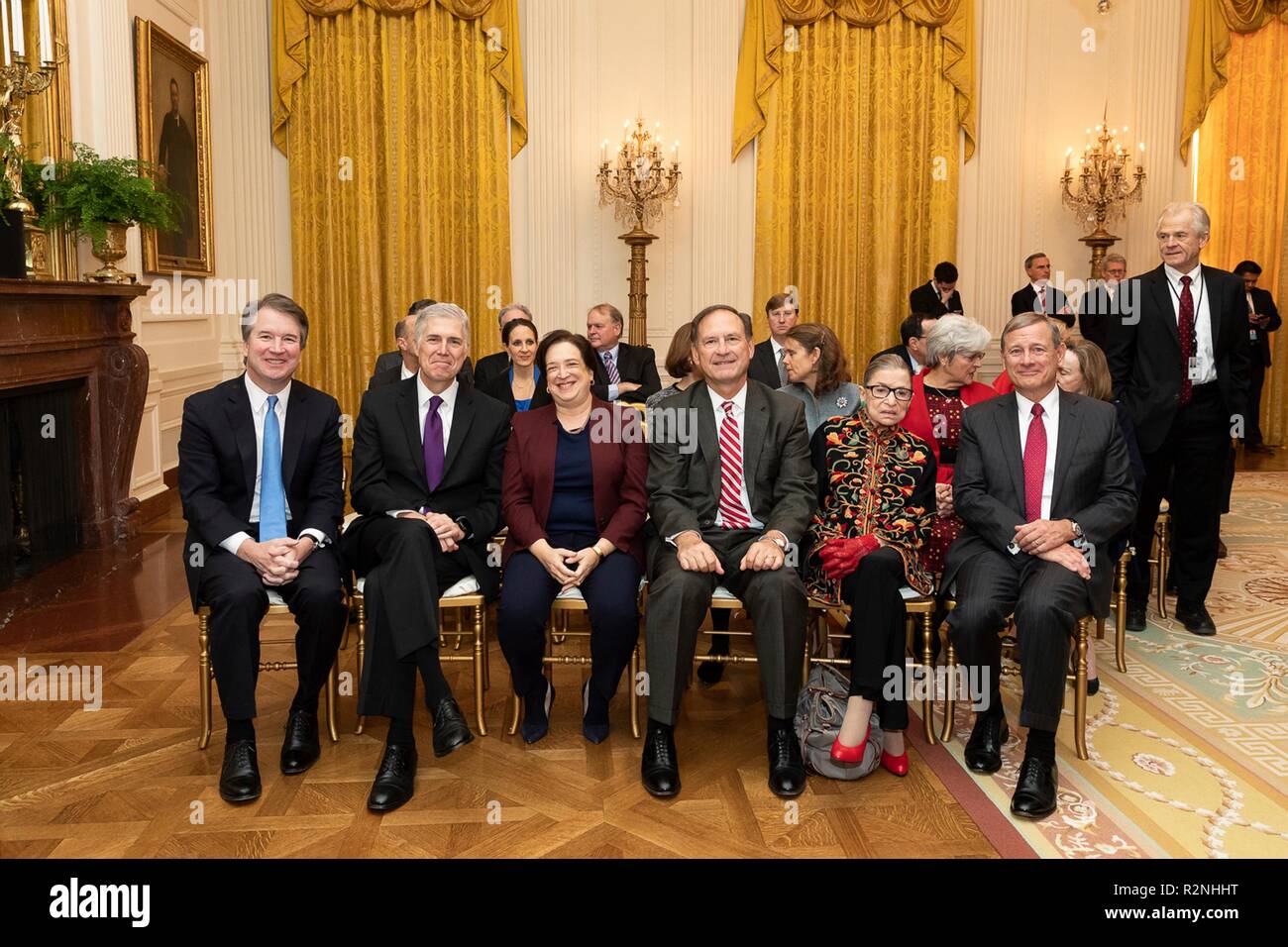 Justices of the U.S. Supreme Court attend the Presidential Medal of Freedom award ceremony in the East Room of the White House November 16, 2018 in Washington, D.C. Sitting from left to right are: Brett Kavanaugh, Neil Gorsuch, Elena Kagan, Samuel Alito, Ruth Bader Ginsburg and Chief Justice John Roberts. Stock Photo