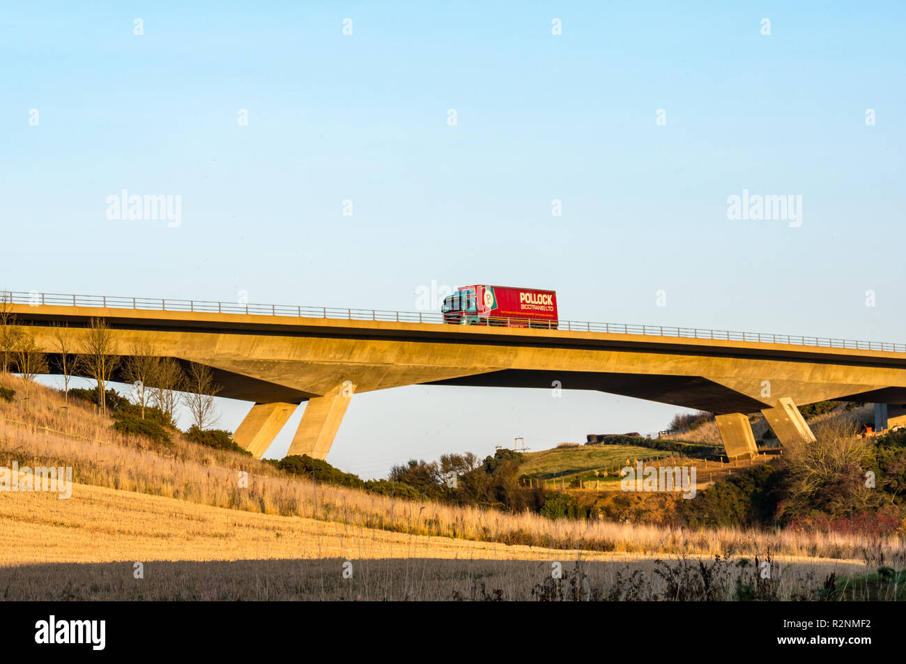 Pollock transport lorry on River Tyne concrete flyover bridge by Balfour Beatty Civil Engineering on A1 dual carriageway, East Lothian, Scotland, UK Stock Photo