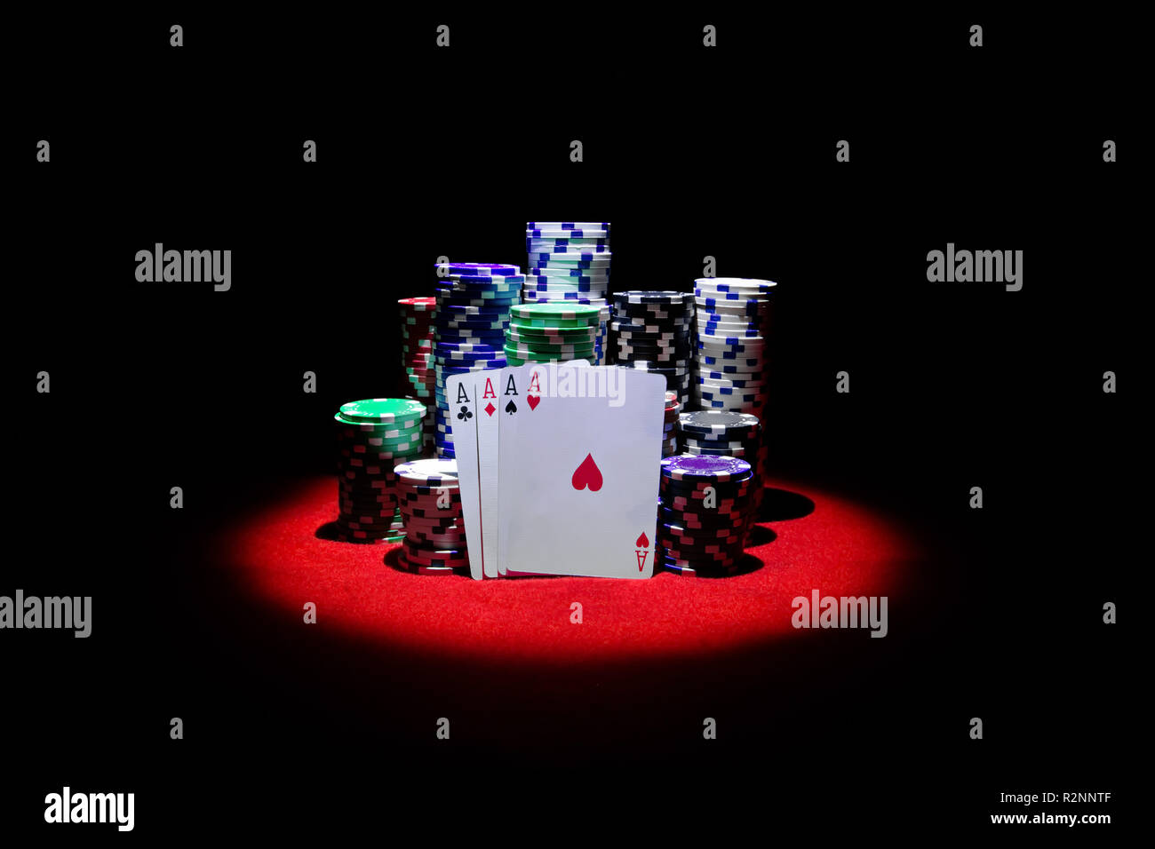 Four aces  stack of gambling chips and red dices Stock Photo