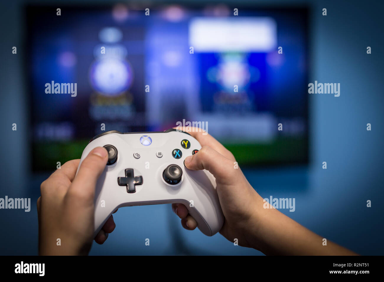 Debrecen, Hungary, 19. November 2017 View from the top on xbox one s gamepad, game console, kid holding in his hands Stock Photo