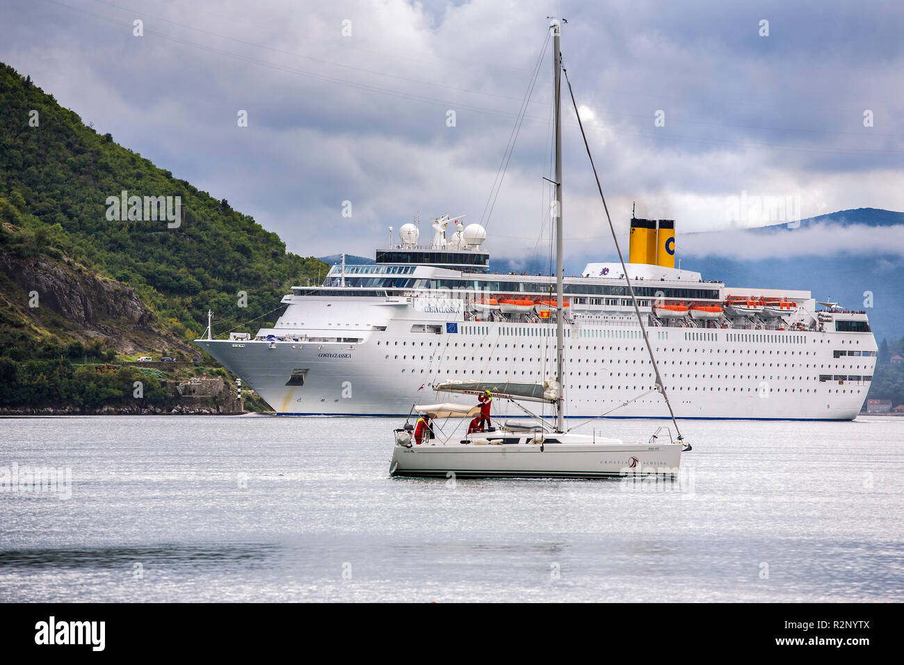 Cruise ship 'Costa Classica' approaching Perast through the Verige strait, Boka Kotorska, Montenegro Stock Photo